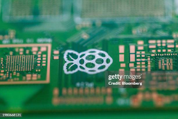 Raspberry logo on a printed circuit board for Raspberry Pi personal computers on the production line at the Sony UK Technology Centre in Pencoed, UK,...