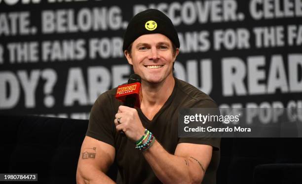 Stephen Amell speaks at MegaCon Orlando 2024 at Orange County Convention Center on February 02, 2024 in Orlando, Florida.