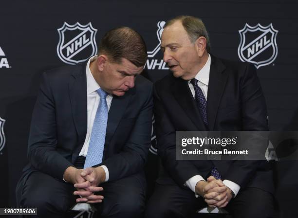 Executive director Marty Walsh and NHL commissioner Gary Bettman chat on February 02, 2024 at the Scotiabank Arena in Toronto, Ontario, Canada.