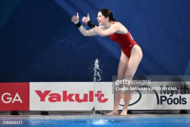 Britain's Andrea Spendolini-Sirieix gestures after competing in the final of the women's 10m platform diving event during the 2024 World Aquatics...