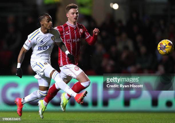 Crysencio Summerville of Leeds United takes a shot whilst under pressure from George Tanner of Bristol City during the Sky Bet Championship match...