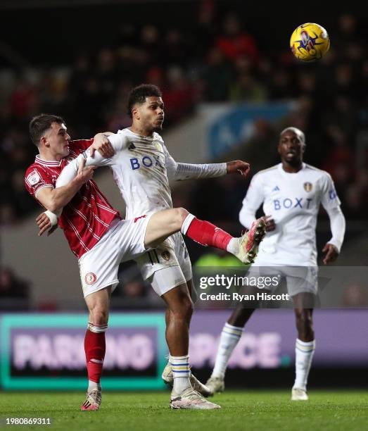 Georginio Rutter of Leeds United is tackled by Jason Knight of Bristol City during the Sky Bet Championship match between Bristol City and Leeds...