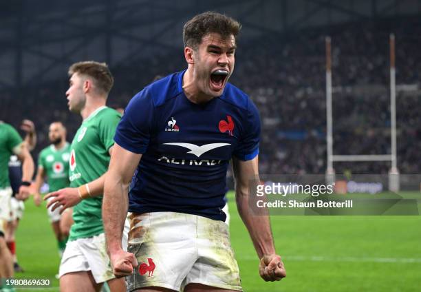 Damian Penaud of France celebrates scoring his team's first try during the Guinness Six Nations 2024 match between France and Ireland at Orange...