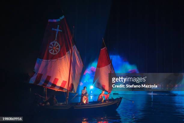 Artists perform by boat during the Venice Carnival's "Terra Incognita" show, organized by VelaSpa, at the Arsenale on February 02, 2024 in Venice,...