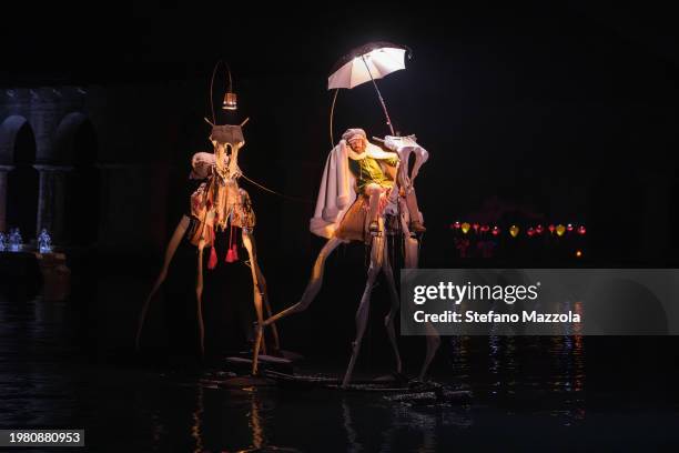 Artists perform by boat during the Venice Carnival's "Terra Incognita" show, organized by VelaSpa, at the Arsenale on February 02, 2024 in Venice,...