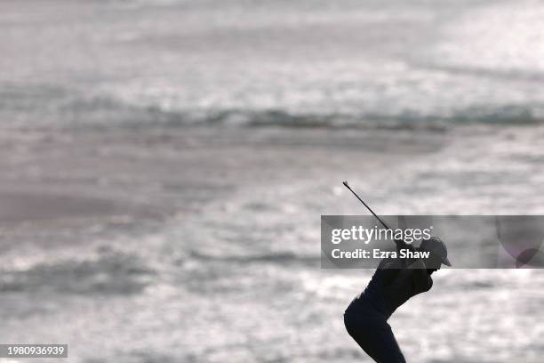 Tommy Fleetwood of England plays a shot on the ninth hole during the second round of the AT&T Pebble Beach Pro-Am at Pebble Beach Golf Links on...