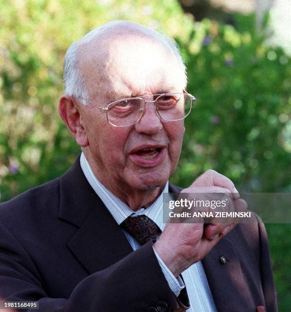 Former apartheid-era State President P W Botha angrily adresses journalists at his home in Wilderness outside George 16 April, after his trial was...