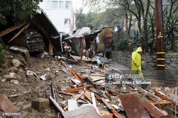 Mud and debris block portions of the 10000 block of Caribou Lane, where a mudslide destroyed a home on Monday, Feb. 5 in the Beverly Crest area of...