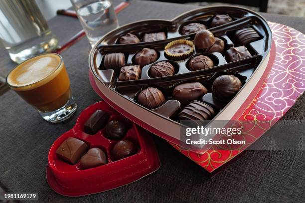 In this photo illustration, chocolates packaged for Valentine's Day sit on a table on February 02, 2024 in Chicago, Illinois. Cocoa prices have...