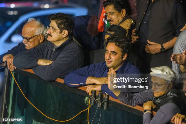 Bilawal Bhutto Zardari, chairman of Pakistan Peoples Party and former foreign minister, front row second right, during a election campaign rally in...