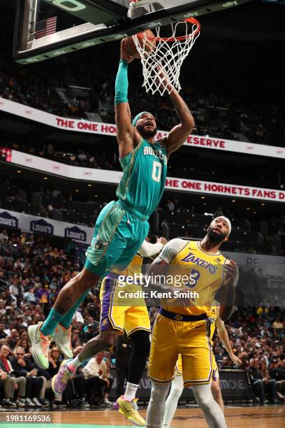 Miles Bridges of the Charlotte Hornets drives to the basket during the game against the Los Angeles Lakers on February 5, 2024 at Spectrum Center in...