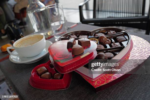 In this photo illustration, chocolates packaged for Valentine's Day sit on a table on February 02, 2024 in Chicago, Illinois. Cocoa prices have...