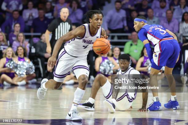 Kansas State Wildcats guard Dai Dai Ames leads a fast break in the first half of a Big 12 basketball game between the Kansas Jayhawks and Kansas...