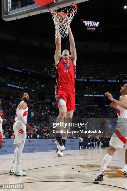 Cody Zeller of the New Orleans Pelicans dunks the ball during the game against the Toronto Raptors on February 5, 2024 at the Smoothie King Center in...