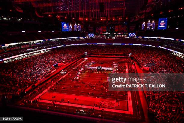 Fans cheer as Quarterback Patrick Mahomes of the Kansas City Chiefs speaks during Super Bowl LVIII Opening Night at Allegiant Stadium in Las Vegas,...