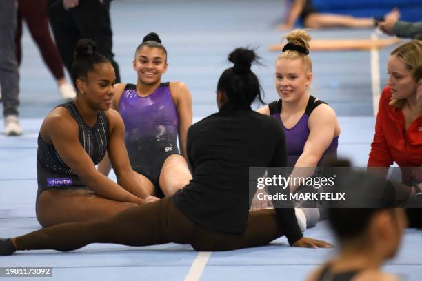 Gymnasts Zoe Miller, Tiana Sumanasekera and Joscelyn Roberson talk to Simone Biles at the USA Gymnastics Women's Artistic and Rhythmic Gymnastics...