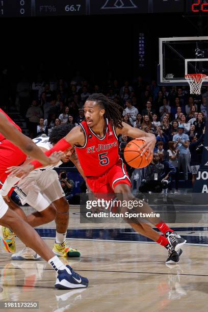 St. John's Red Storm guard Daniss Jenkins handles the ball during a college basketball game against the Xavier Musketeers on January 31, 2024 at...