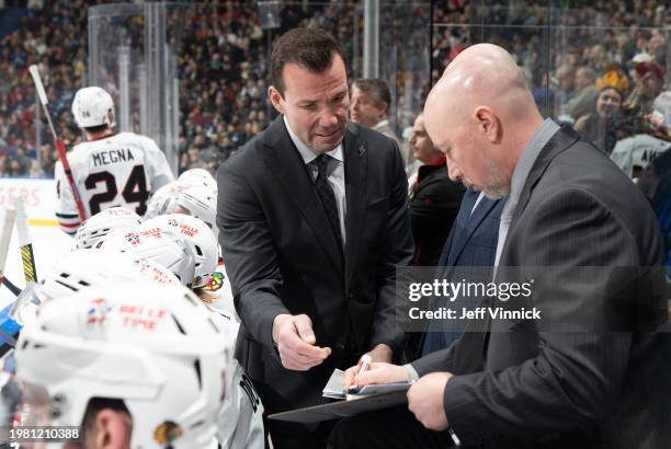 Head coach Luke Richardson of the Chicago Blackhawks looks on from the bench during their NHL game against the Vancouver Canucks at Rogers Arena on...