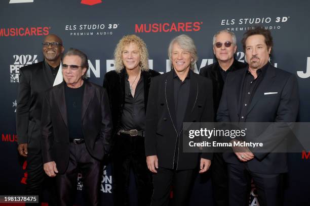 Everett Bradley, Tico Torres, David Bryan, Jon Bon Jovi, Hugh McDonald and John Shanks of Bon Jovi attend the 2024 MusiCares Person of the Year...