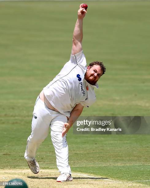 Jarrod Freeman of Tasmania bowls during the Sheffield Shield match between Queensland and Tasmania at The Gabba, on February 03 in Brisbane,...