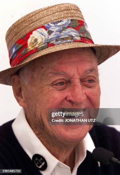 Golfing legend Sam Snead has a laugh during his press conference at St. Andrews 17 July 2000. Snead will be the oldest among a group of 22 past...