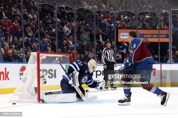 Cale Makar of the Colorado Avalanche competes in the Honda NHL One-on-One against Connor Hellebuyck of the Winnipeg Jets during 2024 NHL All-Star...