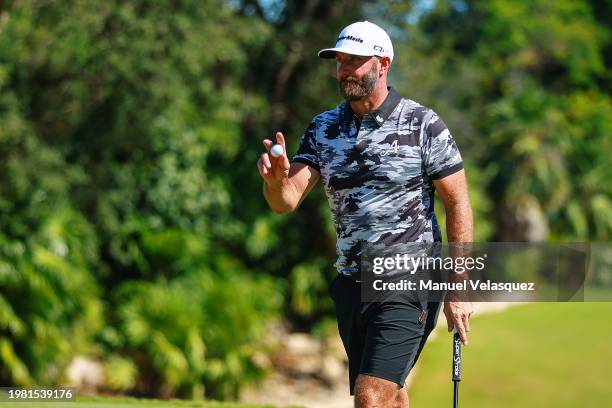 Captain Dustin Johnson of 4aces GC salutes to the fans during day one of the LIV Golf Invitational - Mayakoba at El Camaleon at Mayakoba on February...