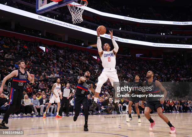 Russell Westbrook of the LA Clippers drives to the basket against Monte Morris of the Detroit Pistons during the second half at Little Caesars Arena...
