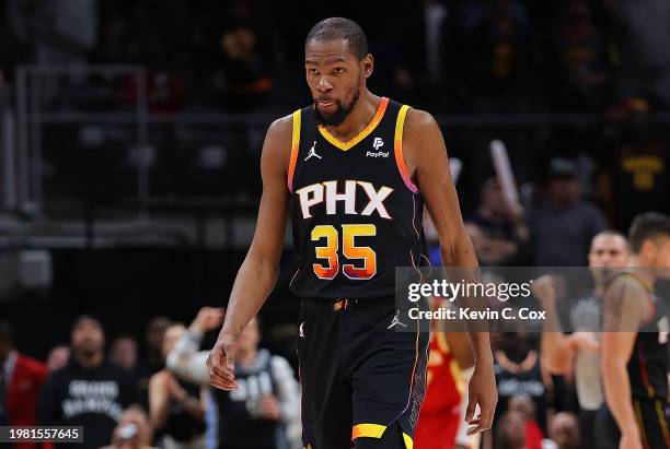 Kevin Durant of the Phoenix Suns reacts in the final seconds of their 129-120 loss to the Atlanta Hawks at State Farm Arena on February 02, 2024 in...