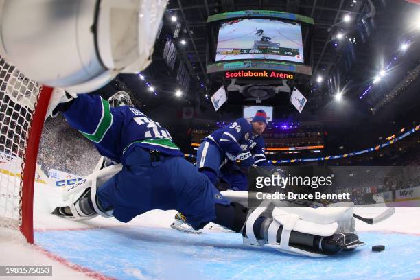 Auston Matthews of the Toronto Maple Leafs scores a goal in the Honda NHL One-on-One against Thatcher Demko of the Vancouver Canucks during 2024 NHL...