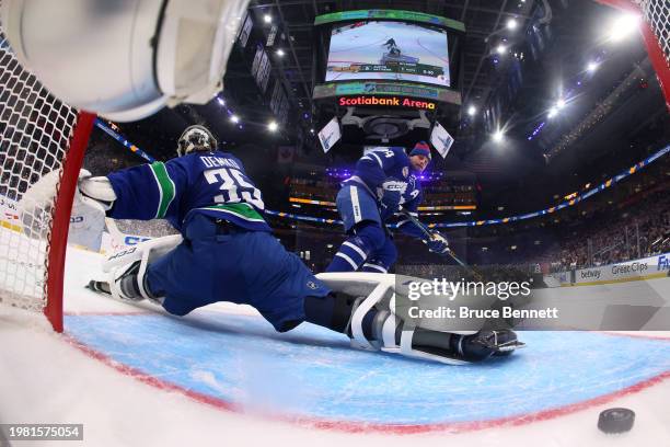 Auston Matthews of the Toronto Maple Leafs scores a goal in the Honda NHL One-on-One against Thatcher Demko of the Vancouver Canucks during 2024 NHL...