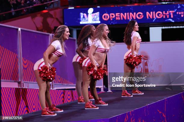 The San Francisco 49ers Gold Rush Cheerleaders perform on stage during the Super Bowl LVIII Opening Night presented by Gatorade featuring the AFC...