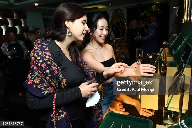 Sara Nolla and Chloe Zhang attend the Miraco Valentine's Day Jewelry Party featuring founder Samira Baraki hosted by Franco Nuschese at Cafe Milano...