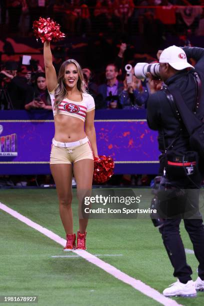 The San Francisco 49ers Gold Rush Cheerleaders perform on stage during the Super Bowl LVIII Opening Night presented by Gatorade featuring the AFC...