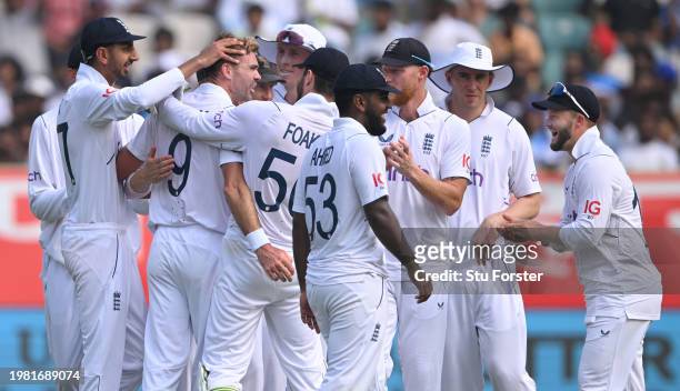 England bowler James Anderson celebrates with team mates after taking the wicket of Ravi Ashwin after review during day two of the 2nd Test Match...
