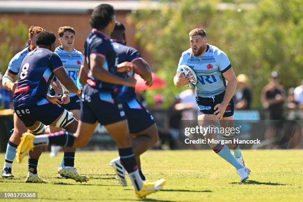 Lachie Swinton of the Waratahs takes possession of the ball during the Super Rugby Pacific Trial Match between Melbourne Rebels and NSW Waratahs at...