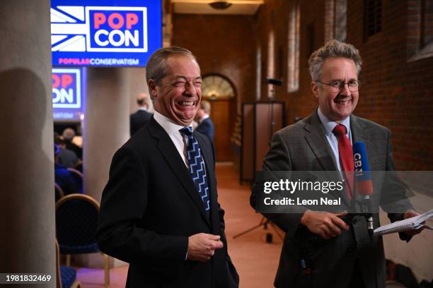 Nigel Farage gives an interview at the 'Popular Conservatives' conference on February 6, 2024 in London, England. PopCon, a new Conservative grouping...