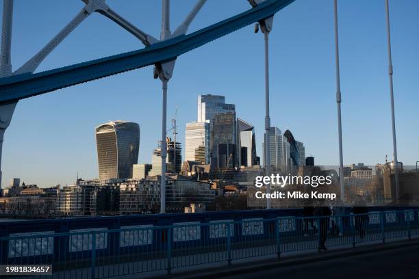 City of London skyline looking over the River Thames through the structure of Tower Bridge on 16th January 2024 in London, United Kingdom. The City...