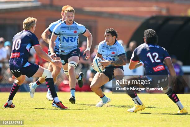 Izaia Perese of the Waratahs runs with the ball during the Super Rugby Pacific Trial Match between Melbourne Rebels and NSW Waratahs at Harold...