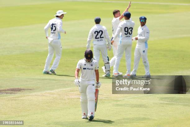Jayden Goodwin of Western Australia walks from the field after being dismissed by Jackson Bird of New South Wales during the Sheffield Shield match...
