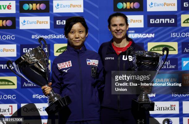 Miho Takagi of Japan and Brittany Bowe of the United States pose with their the World Cup trophies during the ISU World Cup Speed Skating at the...