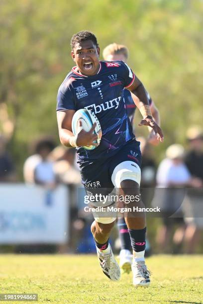 Angelo Smith of the Rebels runs with the ball during the Super Rugby Pacific Trial Match between Melbourne Rebels and NSW Waratahs at Harold Caterson...