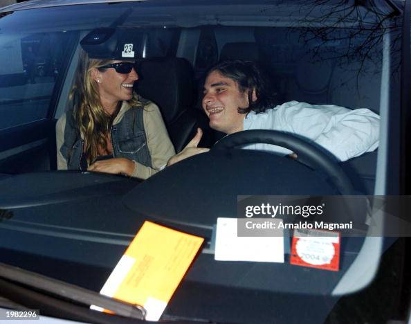 Model Gisele Bundchen shares a laugh with Helly Nahmad while they