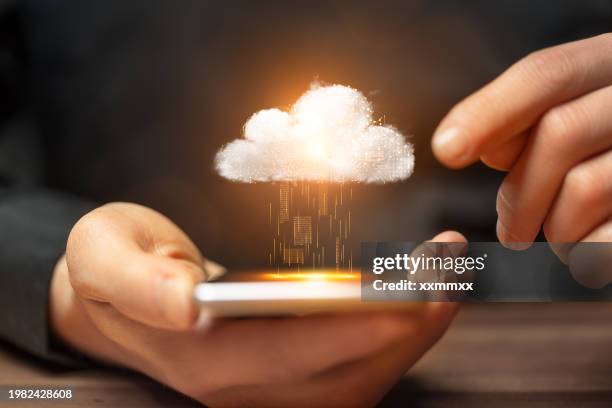 cloud computing artificial intelligence backup sybol with smartphone in man hands on table. - backup imagens e fotografias de stock