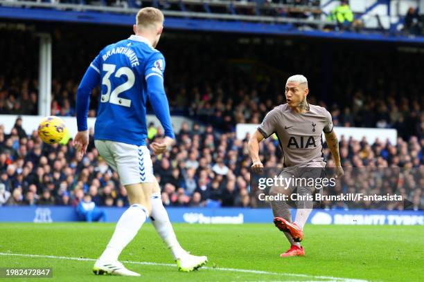 Richarlison of Tottenham Hotspur scores the opening goalduring the Premier League match between Everton FC and Tottenham Hotspur at Goodison Park on...