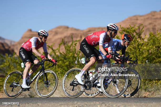 Ben Hermans of Belgium, Nicolas Debeaumarche of France and Team Cofidis and Alessandro De Marchi of Italy and Team Jayco-AlUla compete during the the...