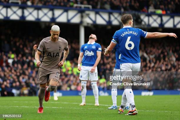 Richarlison of Tottenham Hotspur celebrates scoring his team's second goal during the Premier League match between Everton FC and Tottenham Hotspur...