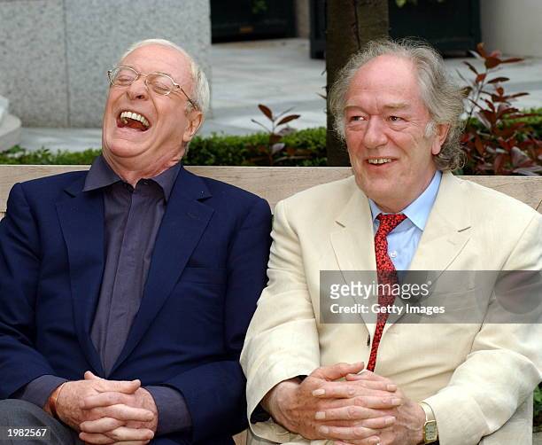 Actors Sir Michael Caine and Sir Michael Gambon attend a press conference for their movie "The Actors" at the Four Seasons Hotel on May 8, 2003 in...