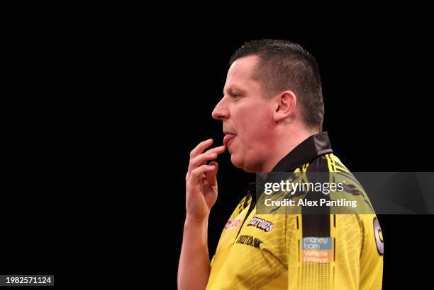 Dave Chisnall during his match against Danny Noppert at Marshall Arena on February 03, 2024 in Milton Keynes, England.