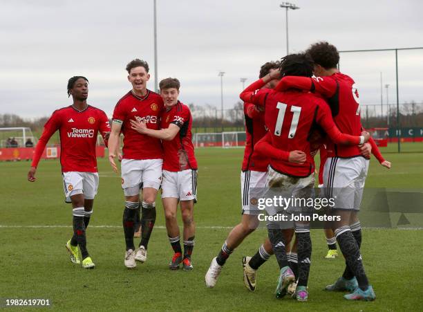 Ethan Williams of Manchester United U18s celebrates scoring their third goal during the U18 Premier League match between Manchester United U18s and...